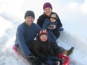 Cornucopia Policy Director, Charlotte Vallaeys, with her husband Will and their two sons, Liam and Kai.