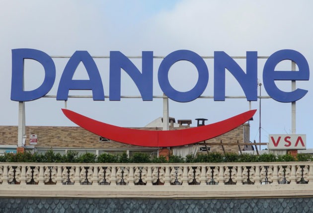 Large Danone sign atop a building